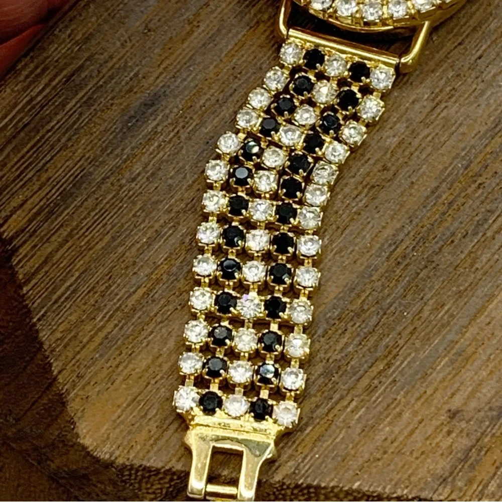 Jalga Quartz watch with black and clear prong set sparkling rhinestone 7”